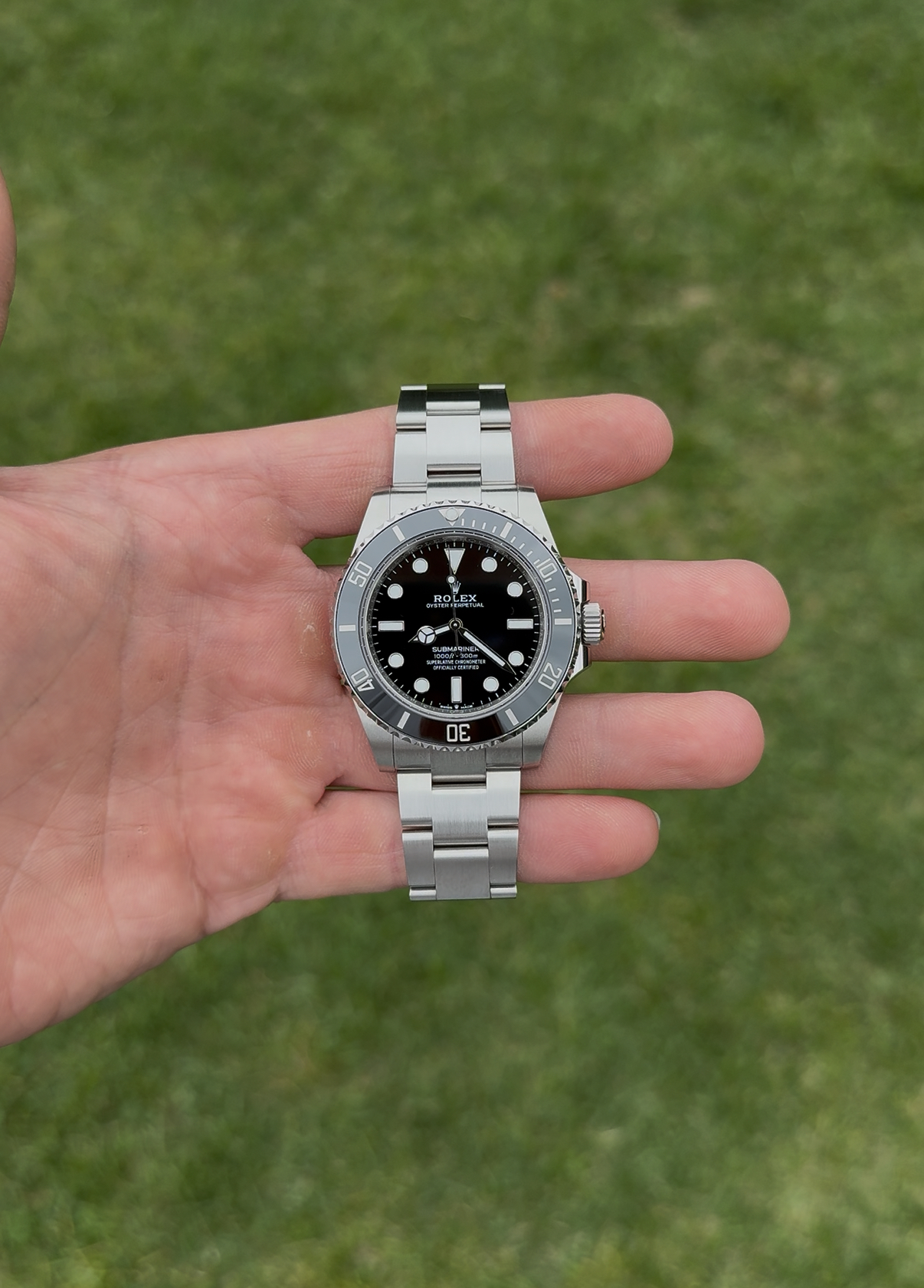 Rolex Submariner No-Date ref 124060 in hand